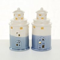 Leuchtturm aus Porzellan in blau/weiÃŸ mit LED Beleuchtung in zwei Varianten ein groÃŸes Fenster